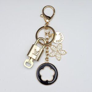 Authentic Louis Vuitton Lock & Key with Unbranded Flower Charm, Keychain